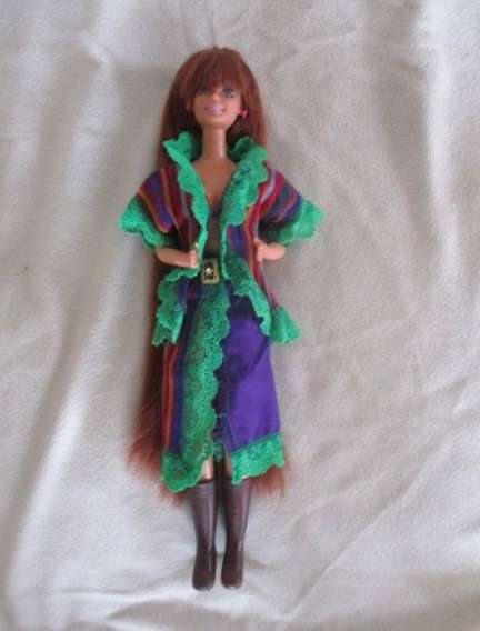 A Mattel Barbie with gorgeous EXTRA long red hair in colourful gypsy outfit with boots - knees bend