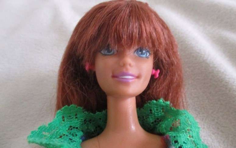 A Mattel Barbie with gorgeous EXTRA long red hair in colourful gypsy outfit with boots - knees bend