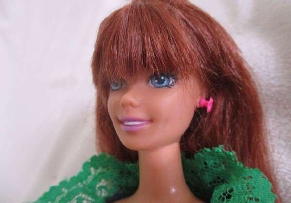A Mattel Barbie with gorgeous EXTRA long red hair in colourful gypsy outfit with boots - knees bend