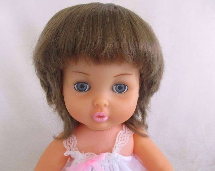 Vintage 40cm First Love brunette doll in original dress