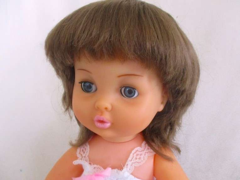 Vintage 40cm First Love brunette doll in original dress
