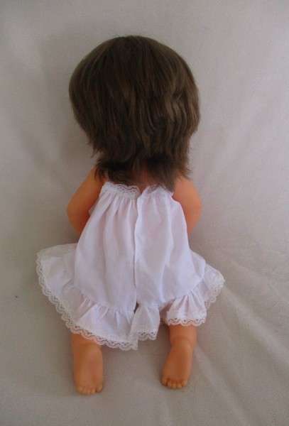 Vintage 40cm First Love brunette doll in original dress