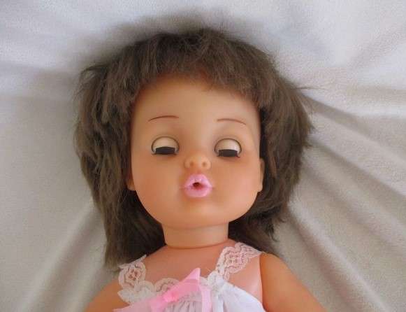 Vintage 40cm First Love brunette doll in original dress