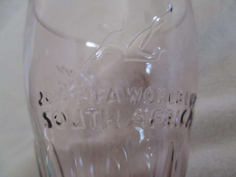 2010 FIFA World Cup and 2012 Olympics - Four collectable Coca Cola glasses plus bottle opener