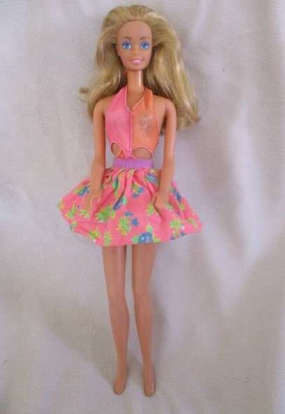 Vintage Mattel Barbie doll in swimsuit and skirt -  Knees bend