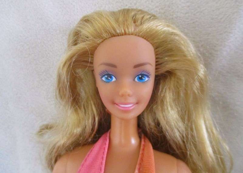 Vintage Mattel Barbie doll in swimsuit and skirt -  Knees bend