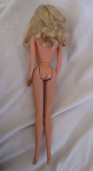 Vintage Mattel Barbie doll in swimsuit and skirt -  Knees bend