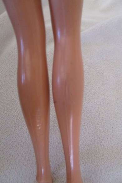 Vintage Mattel Barbie doll in swimsuit and skirt -  Knees bend