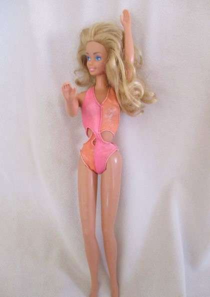 Vintage Mattel Barbie doll in swimsuit and skirt -  Knees bend