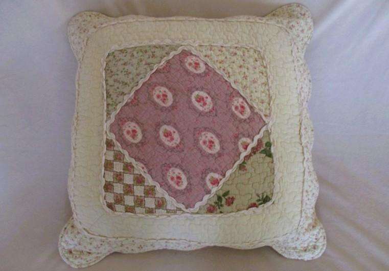 A beautiful quilted cushion in great condition