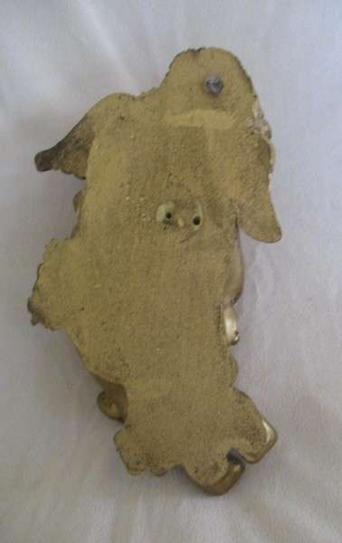 A cute larger size cherub wall plaque - cherub blowing trumpet