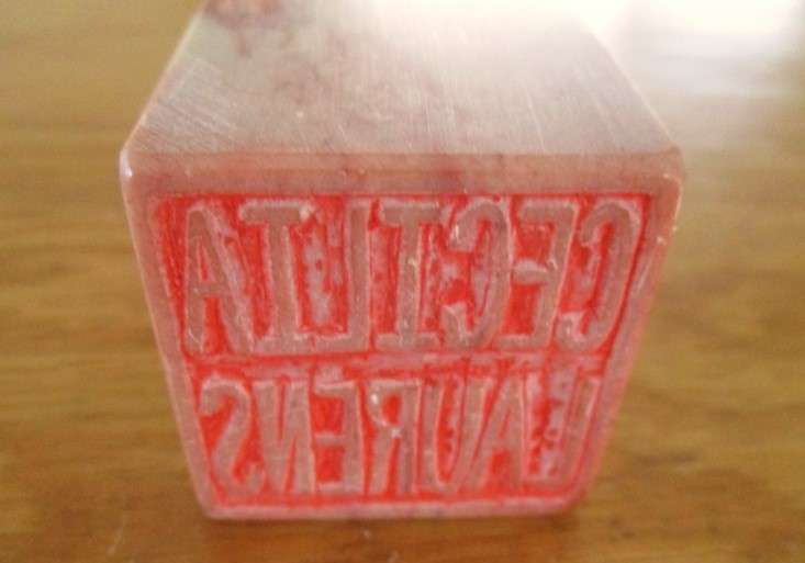 A Chinese seal carved from stone (Rose Agate?) - intricately carved Foo dogs/lions