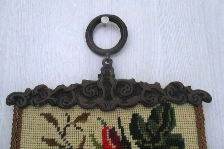 Well made vintage tapestry wall hanging with roses and flowers and ornate metal top and bottom frame