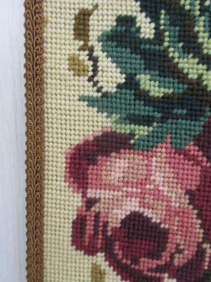 Well made vintage tapestry wall hanging with roses and flowers and ornate metal top and bottom frame