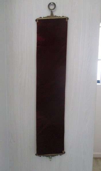 Well made vintage tapestry wall hanging with roses and flowers and ornate metal top and bottom frame