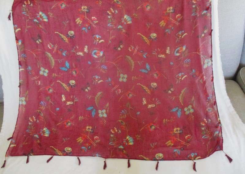 A delicate cloth with pretty butterfly and flowers design