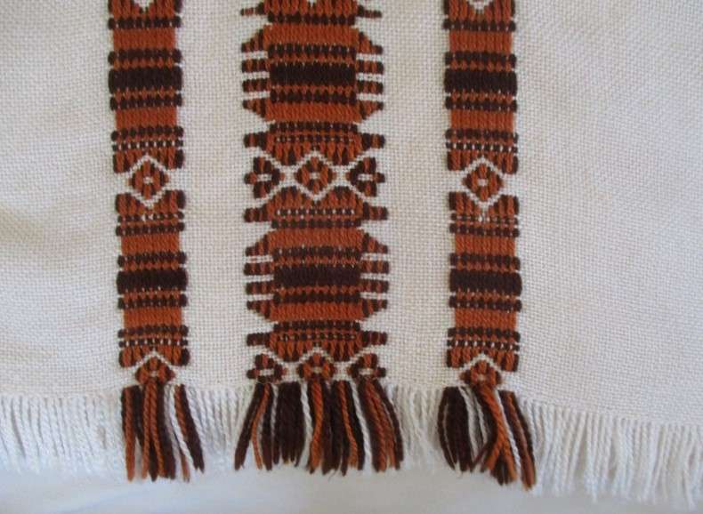 A large, quality throw with embroidered geometric design - in great condition