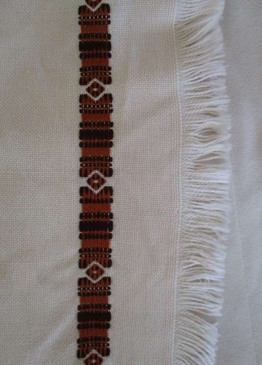 A large, quality throw with embroidered geometric design - in great condition