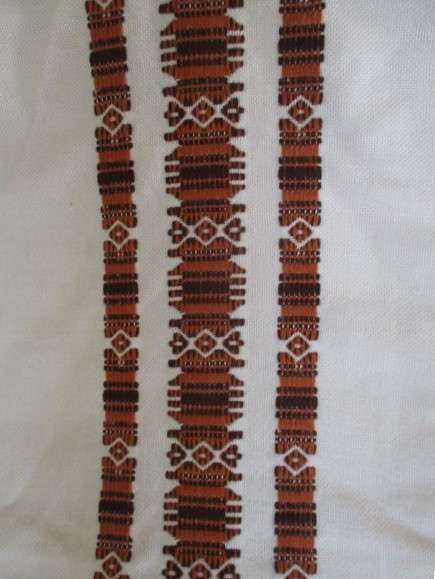 A large, quality throw with embroidered geometric design - in great condition