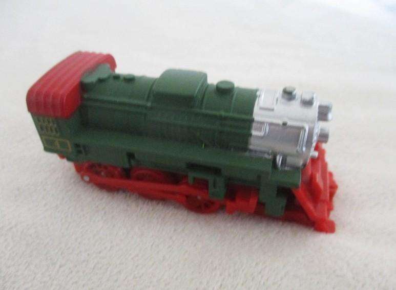 A batch of six small Die Casts - four New-Ray locomotives plus Hot Wheels Ratmobile and Wheel Loader