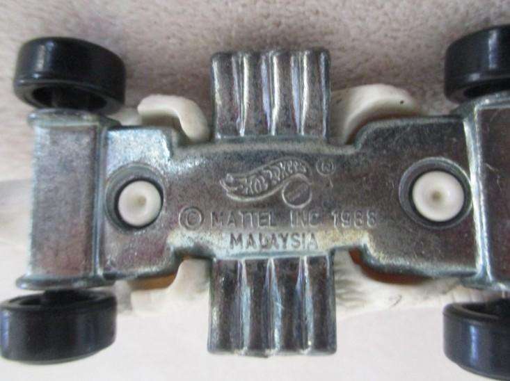 A batch of six small Die Casts - four New-Ray locomotives plus Hot Wheels Ratmobile and Wheel Loader