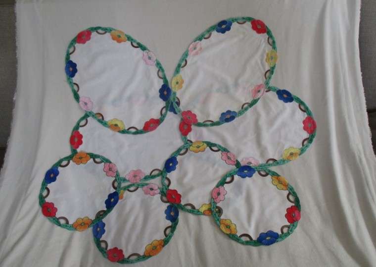 Four larger oval plus four nice-sized round hand made cloths for one price