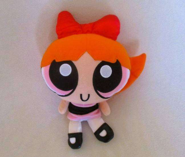 This is Blossom the collectable Cartoon Network Powderpuff girl (vintage 1999)