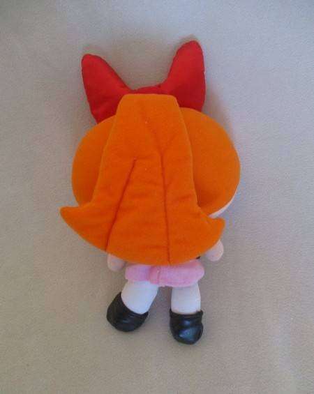 This is Blossom the collectable Cartoon Network Powderpuff girl (vintage 1999)