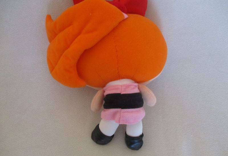 This is Blossom the collectable Cartoon Network Powderpuff girl (vintage 1999)