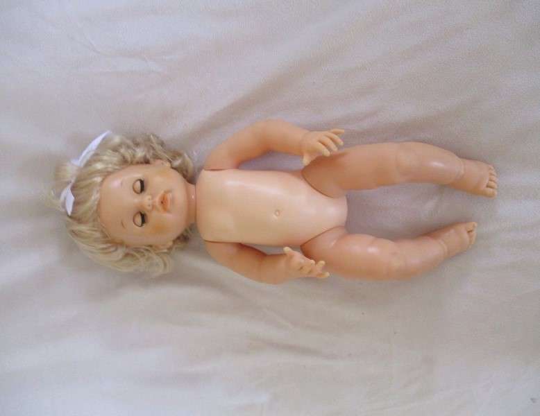 Beautiful Vintage 44cm tall First Love drink and wet doll in original dress