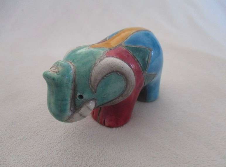 A small Raku elephant -signed by artist - great condition