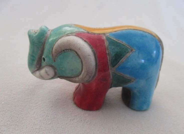 A small Raku elephant -signed by artist - great condition