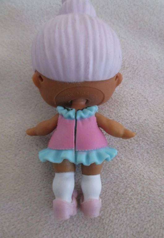 Two cute MGA L.O.L. Surprise dolls with outfits