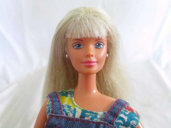 Vintage 1997 articulated Mattel Cool Blue Barbie with original earrings and shoes
