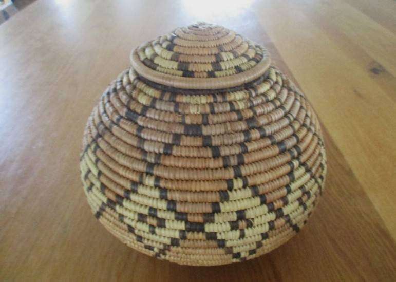 Two vintage, expertly woven lidded snake charmer's baskets in great condition