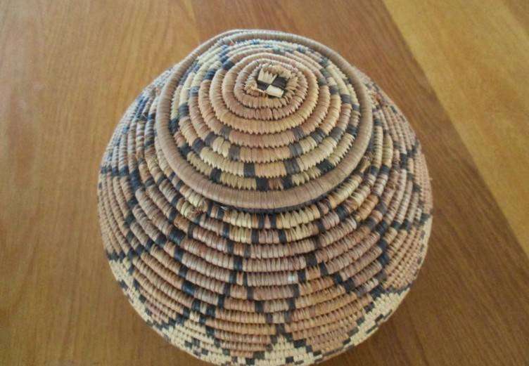 Two vintage, expertly woven lidded snake charmer's baskets in great condition