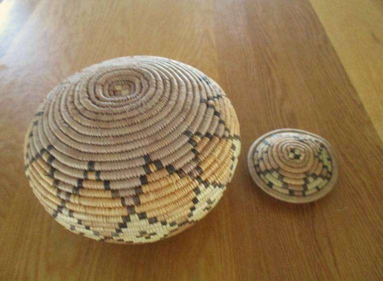 Two vintage, expertly woven lidded snake charmer's baskets in great condition