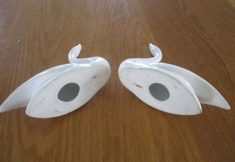 Two elegant white porcelain swans