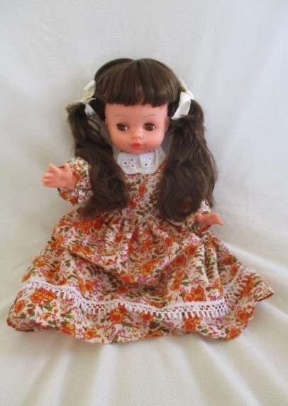 A cute pert-faced vintage doll