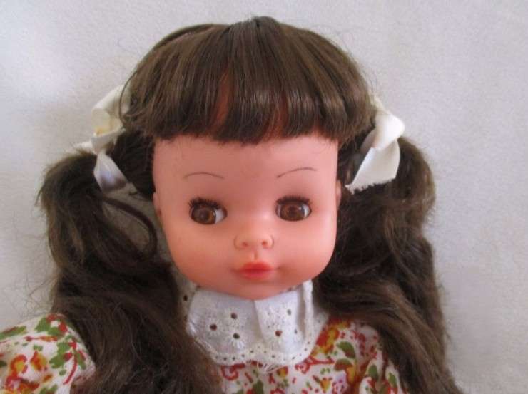 A cute pert-faced vintage doll