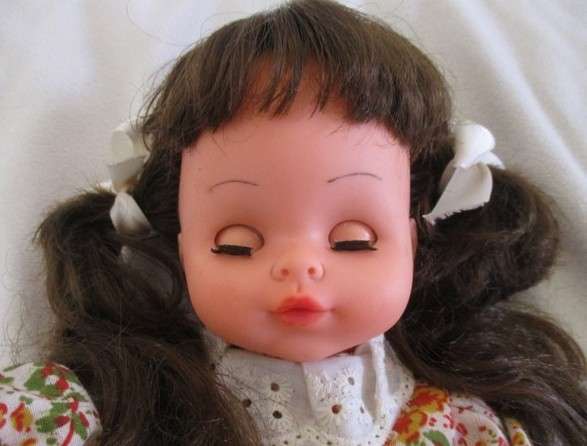 A cute pert-faced vintage doll