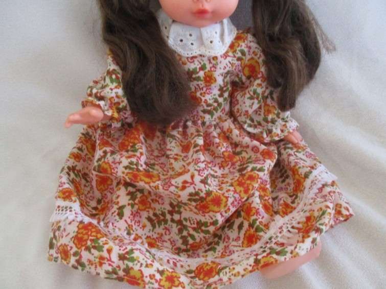 A cute pert-faced vintage doll