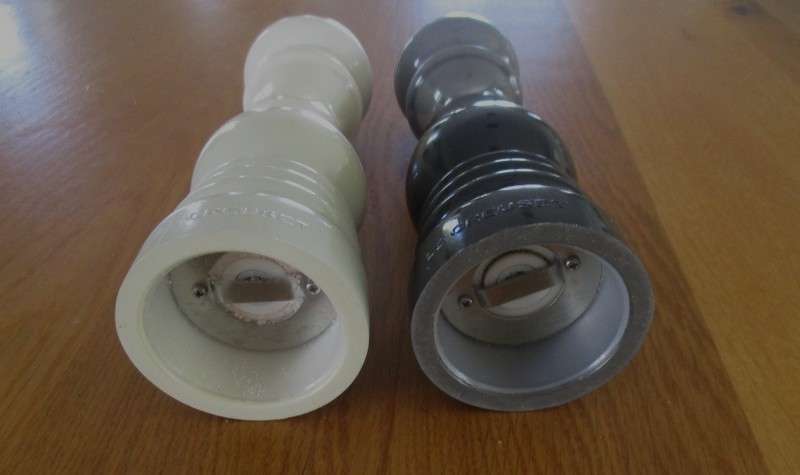 A set of genuine Le Creuset salt and pepper mills in excellent condition