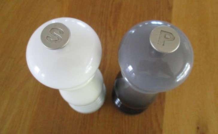 A set of genuine Le Creuset salt and pepper mills in excellent condition
