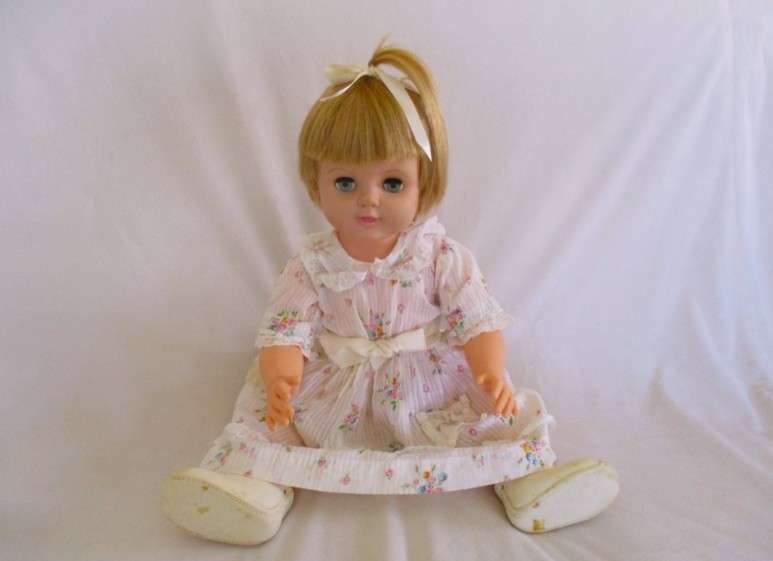 And then this very large 56cm tall vintage 1960's darling girl with her then "modern" hairstyle