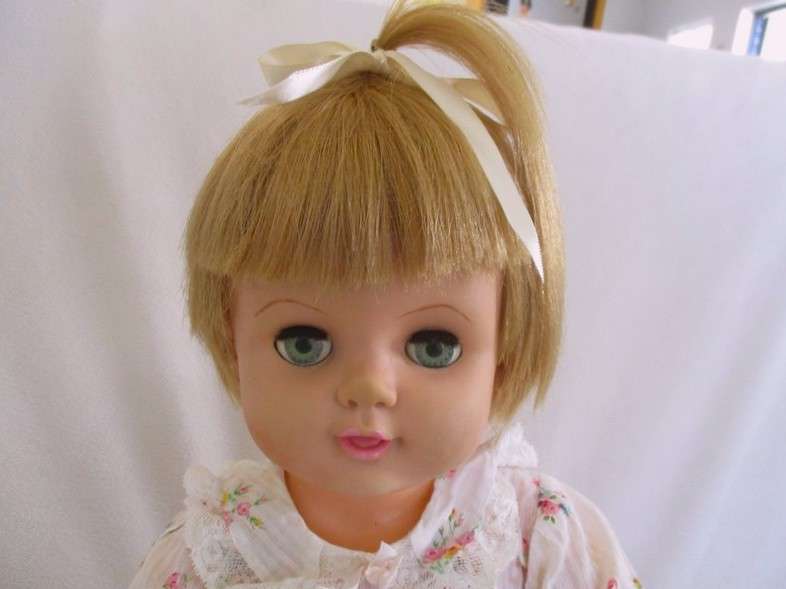 And then this very large 56cm tall vintage 1960's darling girl with her then "modern" hairstyle