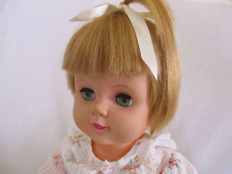 And then this very large 56cm tall vintage 1960's darling girl with her then "modern" hairstyle