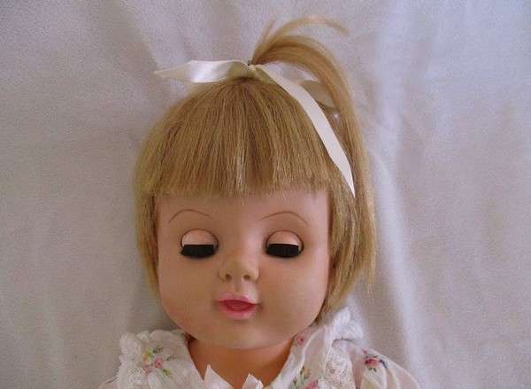 And then this very large 56cm tall vintage 1960's darling girl with her then "modern" hairstyle