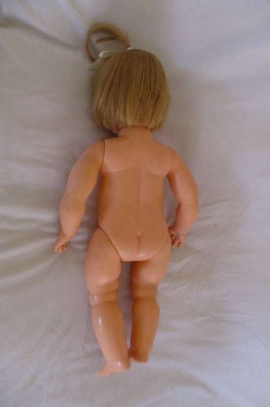 And then this very large 56cm tall vintage 1960's darling girl with her then "modern" hairstyle