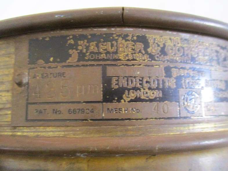 A very old antique gold panning sieve made in England